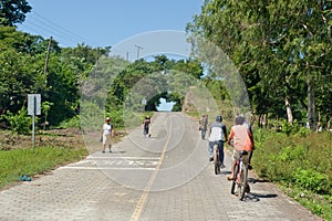 Cyclists on countryside road