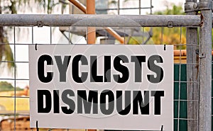 Cyclists Dismount Sign