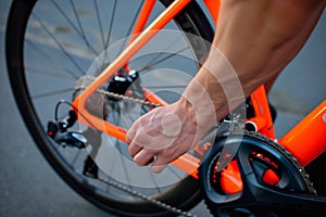 cyclists hand engaging quickrelease skewer