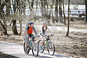 Cyclists in helmet at park