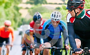 Cyclists racing on country roads