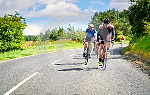 Cyclists racing on country roads