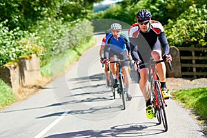 Cyclists racing on country roads