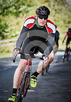 Cyclists racing on country roads