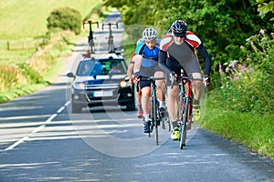 Cyclists racing on country roads