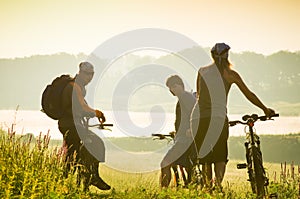 Cyclists relax biking outdoors