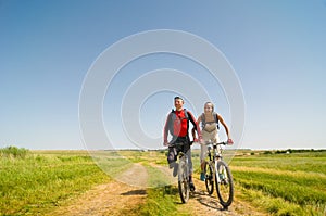 Cyclists relax biking outdoors