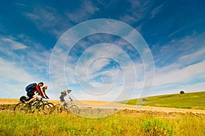 Cyclists relax biking outdoors