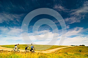 Cyclists relax biking outdoors