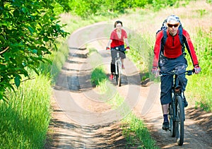 Cyclists relax biking outdoors