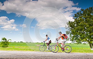 Cyclists relax biking outdoors