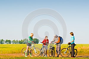 Cyclists relax biking outdoors