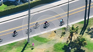 Cyclists riding on bicycles on road of Santa Monica, Los Angeles, California