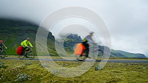 Cyclists travel the roads of Iceland