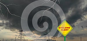 Cyclone alert or warning sign boar with stromy sky background, thunder storm and lightning, cyclone yash