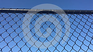 Cyclone chain wire mesh fencing background