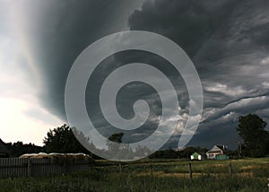 Cyclone over a rural house.