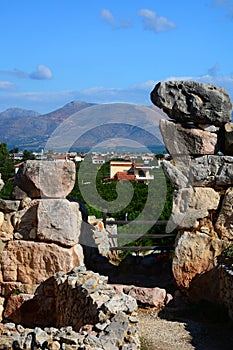 The cyclopean walls of Tiryns - Peloponnese. mountain view