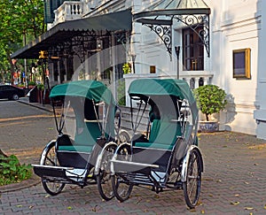 Cyclos outside Sofitel Metropole Hotel in Hanoi