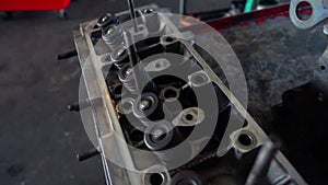Cylinder head block parts on a vintage car engine
