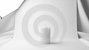 Candle is centrally placed against a white backdrop creating a