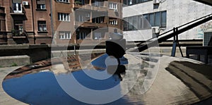 Cymbal with buildings reflection photo