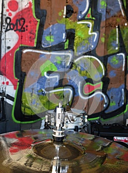 Cymbal with graffiti reflection