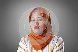 Cynical Muslim Woman Looking to the Side