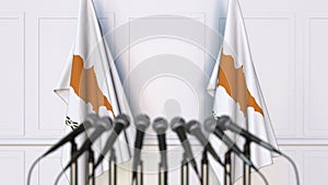 Cypriot official press conference. Flags of Cyprus and microphones. Conceptual 3D rendering