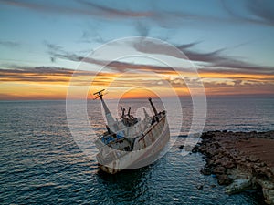 Cyprus - Abandoned shipwreck EDRO III in Pegeia, Paphos, Cyprus at amazing sunset time