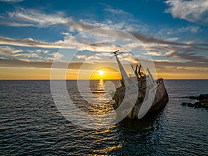 Cyprus - Abandoned shipwreck EDRO III in Pegeia, Paphos, Cyprus from drone view at amazing sunset time