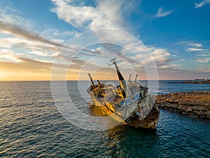 Cyprus - Abandoned shipwreck EDRO III in Pegeia, Paphos, Cyprus from drone view at amazing sunset time