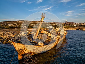 Cyprus - Abandoned shipwreck EDRO III in Pegeia, Paphos, Cyprus from drone view at amazing sunset time