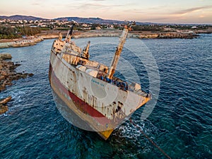 Cyprus - Abandoned shipwreck EDRO III in Pegeia, Paphos, Cyprus from drone view at amazing sunset time