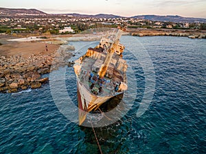 Cyprus - Abandoned shipwreck EDRO III in Pegeia, Paphos, Cyprus from drone view at amazing sunset time