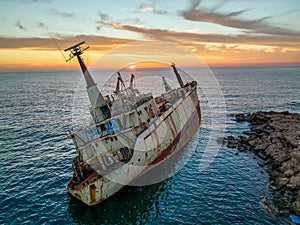 Cyprus - Abandoned shipwreck EDRO III in Pegeia, Paphos, Cyprus from drone view at amazing sunset time