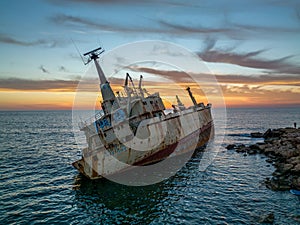 Cyprus - Abandoned shipwreck EDRO III in Pegeia, Paphos, Cyprus from drone view at amazing sunset time