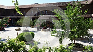 Cyprus. Beautiful summer landscape.	 Monastery courtyard.