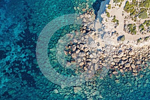 Cyprus coastline aerial top view from drone, Stone Rocks and azure mediterranean sea water in sunny day as beautiful