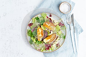 Cyprus fried halloumi with healthy salad. Lchf, pegan, fodmap, paleo, scd, keto, ketogenic diet. Balanced food, clean eating