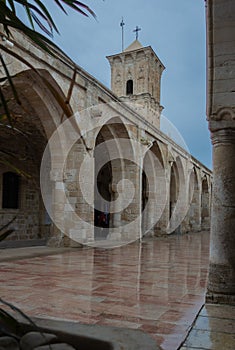 Cyprus. Orthodox Church of St. Lazarus in Larnaca, facade with beautiful decorations and stormy sky after rain