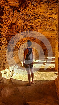 Cyprus - Young man wandering around Kato Paphos Archeological Park