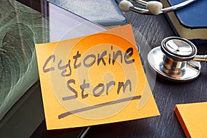 Cytokine storm memo sticker on the hospital table. photo