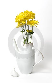 Czech ceramic white teapot with yellow flowers on white background