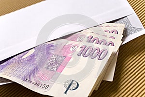 Czech economy and finance - czech crown banknotes in a envelope - bribe and corruption concept