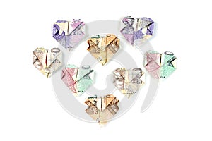 Czech money folded in heart shape isolated on white background