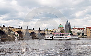 Czech Republic, Charles Bridge across Vltava river on which the ship sails