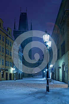 Czech Republic, Pague, Charles Bridge tower in snowfall