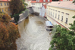 Czech Republic, Prague, certovka river, water water channel, passenger ferryboat the Charles Bridge