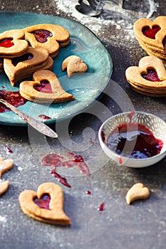 Czech traditional christmas sweets Linzer cookies with homemade red currant jam